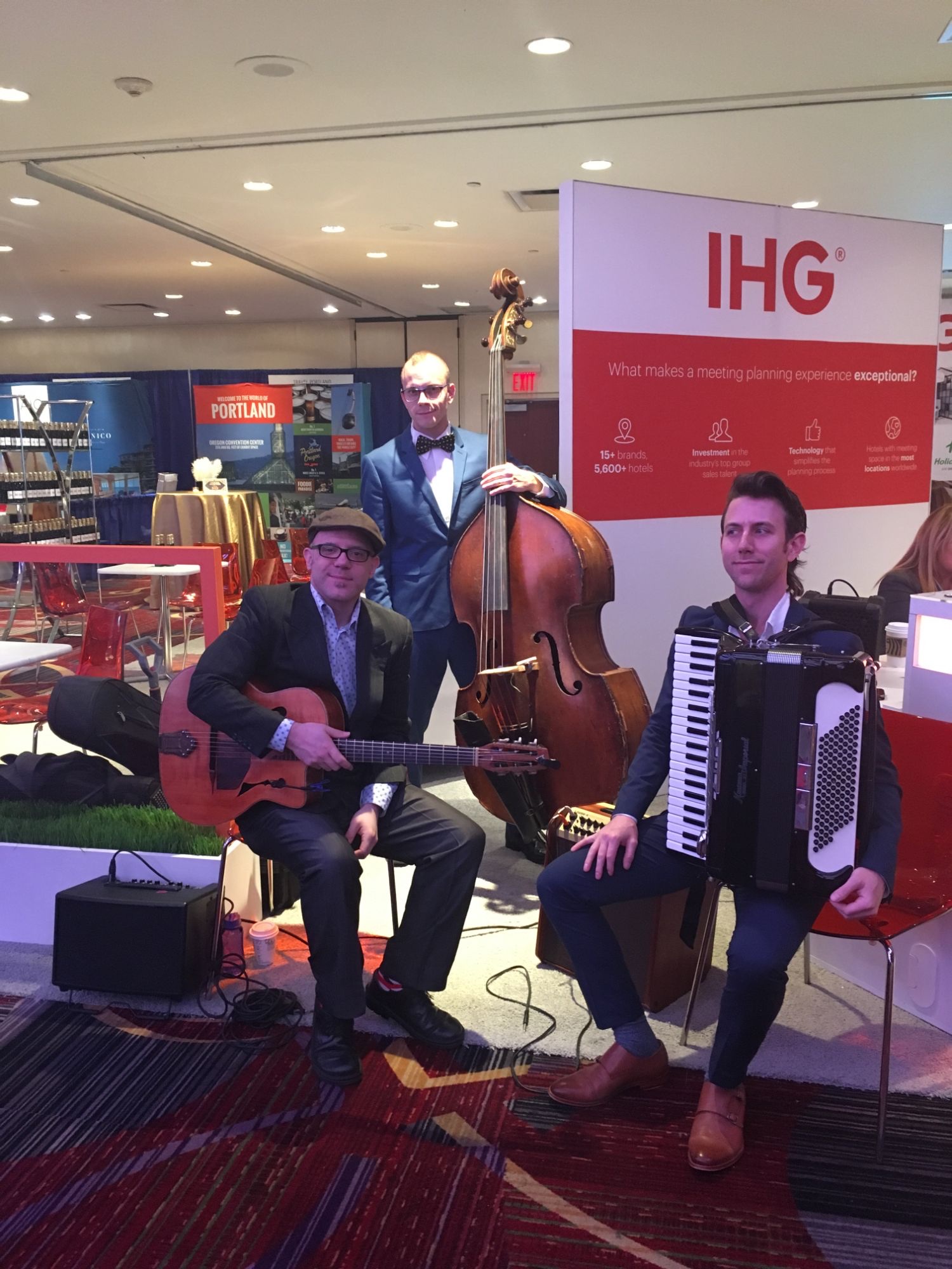Dallas with his Gypsy Jazz trio at a corporate event
